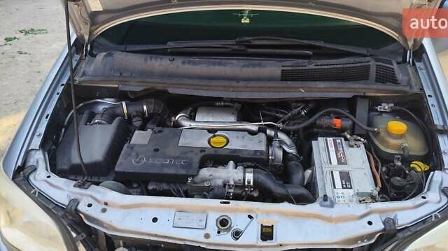 Синий Опель Зафира, объемом двигателя 2 л и пробегом 406 тыс. км за 4000 $, фото 1 на Automoto.ua