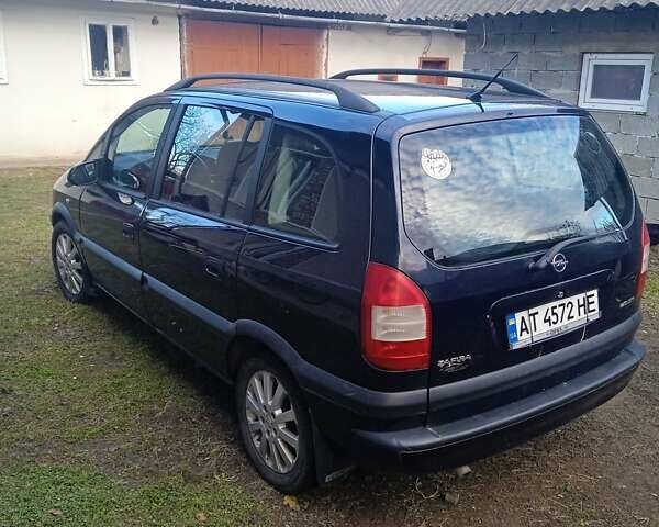 Синий Опель Зафира, объемом двигателя 2 л и пробегом 280 тыс. км за 4000 $, фото 4 на Automoto.ua