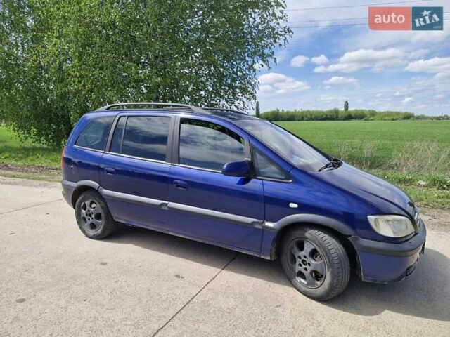 Синий Опель Зафира, объемом двигателя 2 л и пробегом 380 тыс. км за 3100 $, фото 1 на Automoto.ua