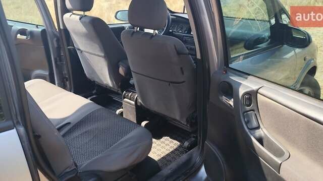 Синий Опель Зафира, объемом двигателя 2 л и пробегом 406 тыс. км за 4000 $, фото 5 на Automoto.ua