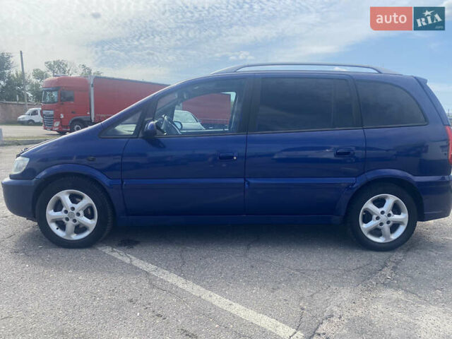 Синий Опель Зафира, объемом двигателя 2.17 л и пробегом 350 тыс. км за 4650 $, фото 2 на Automoto.ua