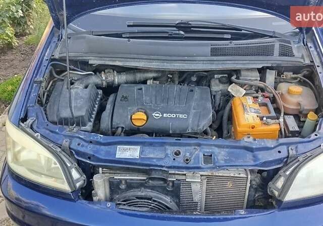 Синий Опель Зафира, объемом двигателя 1.8 л и пробегом 263 тыс. км за 4600 $, фото 5 на Automoto.ua