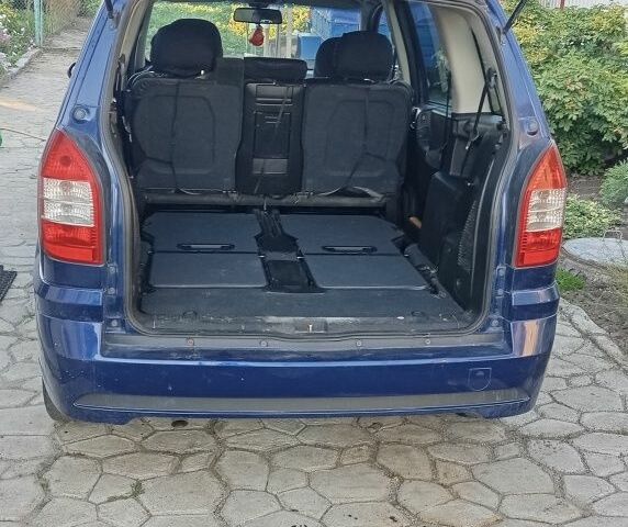 Синий Опель Зафира, объемом двигателя 1.8 л и пробегом 263 тыс. км за 4600 $, фото 3 на Automoto.ua