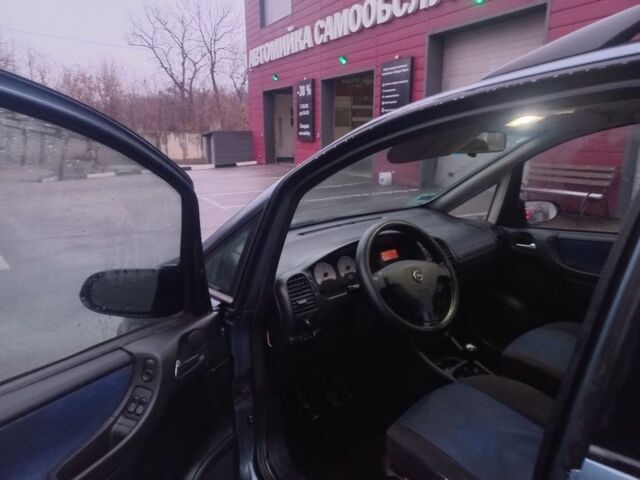 Синий Опель Зафира, объемом двигателя 1.8 л и пробегом 328 тыс. км за 1800 $, фото 6 на Automoto.ua