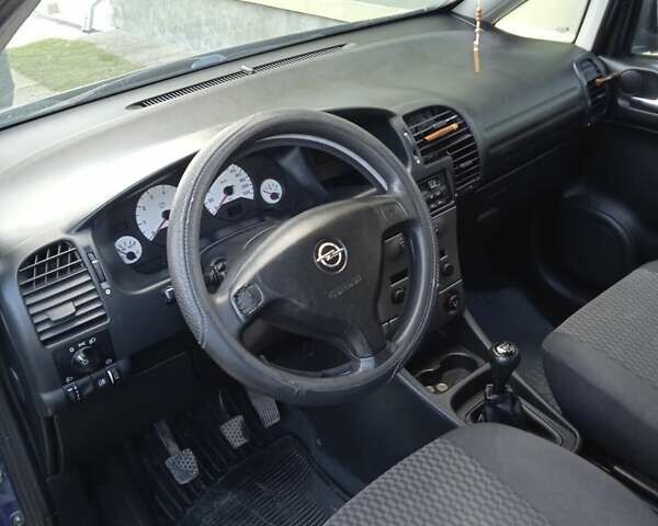 Синий Опель Зафира, объемом двигателя 1.8 л и пробегом 250 тыс. км за 4000 $, фото 18 на Automoto.ua