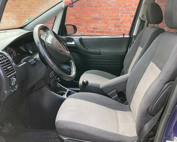 Синий Опель Зафира, объемом двигателя 1.6 л и пробегом 265 тыс. км за 4800 $, фото 4 на Automoto.ua