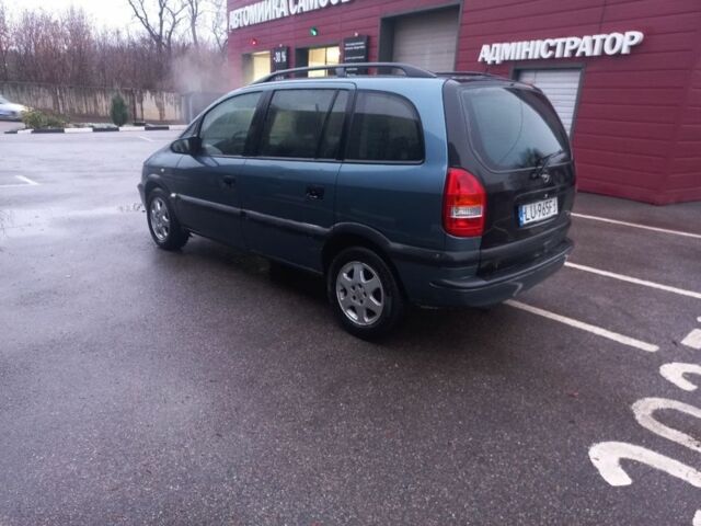 Синий Опель Зафира, объемом двигателя 1.8 л и пробегом 328 тыс. км за 1800 $, фото 2 на Automoto.ua