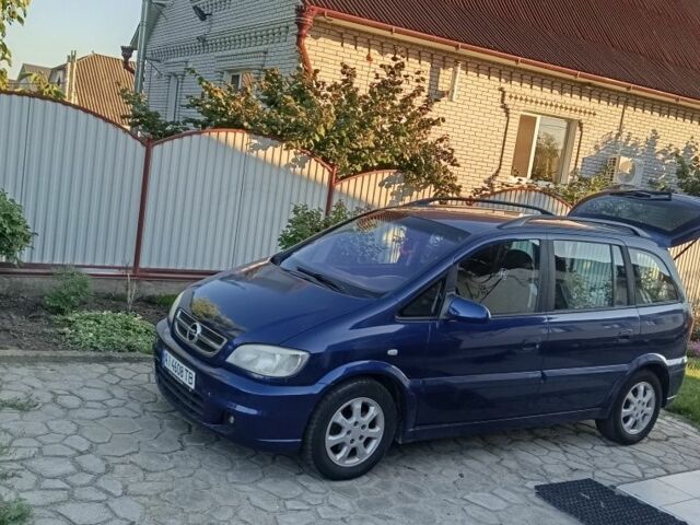 Синий Опель Зафира, объемом двигателя 1.8 л и пробегом 263 тыс. км за 4600 $, фото 1 на Automoto.ua