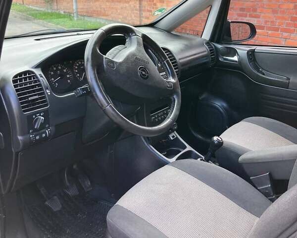 Синий Опель Зафира, объемом двигателя 1.6 л и пробегом 265 тыс. км за 4800 $, фото 3 на Automoto.ua