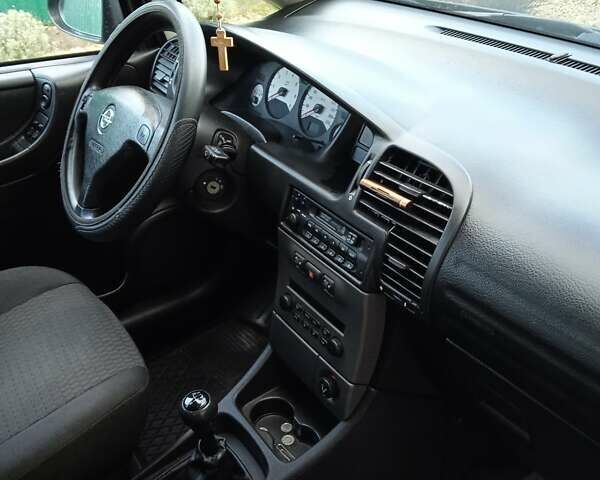 Синий Опель Зафира, объемом двигателя 1.8 л и пробегом 250 тыс. км за 4000 $, фото 7 на Automoto.ua