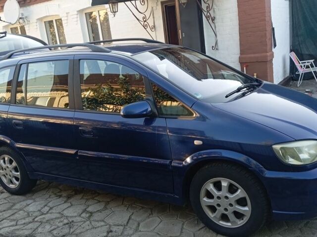 Синий Опель Зафира, объемом двигателя 1.8 л и пробегом 263 тыс. км за 4600 $, фото 2 на Automoto.ua