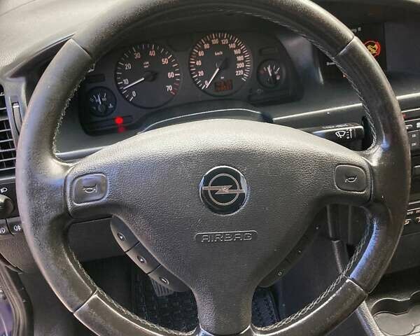 Синий Опель Зафира, объемом двигателя 1.6 л и пробегом 265 тыс. км за 4800 $, фото 6 на Automoto.ua