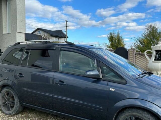 Синий Опель Зафира, объемом двигателя 1.9 л и пробегом 241 тыс. км за 4500 $, фото 4 на Automoto.ua