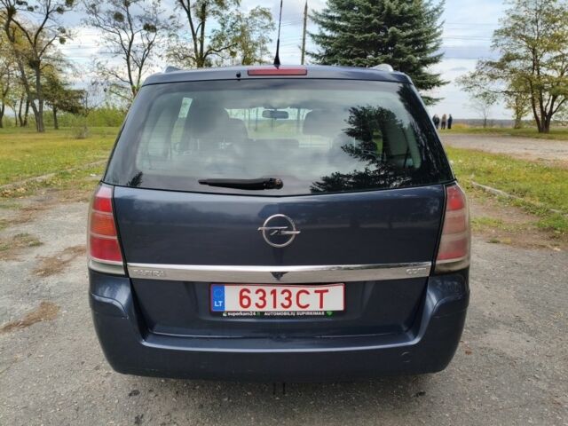 Синий Опель Зафира, объемом двигателя 1.9 л и пробегом 300 тыс. км за 3600 $, фото 3 на Automoto.ua