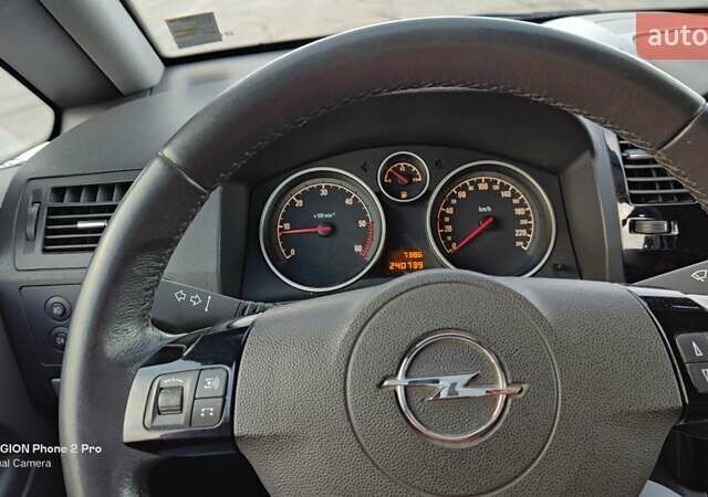 Синий Опель Зафира, объемом двигателя 1.69 л и пробегом 240 тыс. км за 6900 $, фото 21 на Automoto.ua