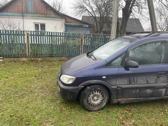 Синий Опель Зафира, объемом двигателя 1.8 л и пробегом 250 тыс. км за 1700 $, фото 2 на Automoto.ua