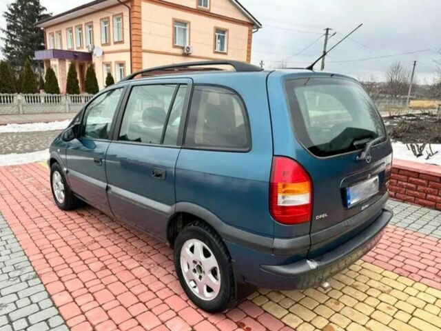 Синий Опель Зафира, объемом двигателя 2 л и пробегом 345 тыс. км за 3600 $, фото 3 на Automoto.ua