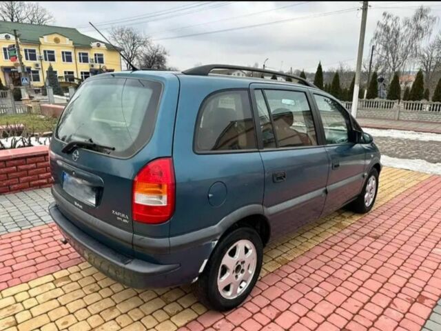 Синий Опель Зафира, объемом двигателя 2 л и пробегом 345 тыс. км за 3600 $, фото 2 на Automoto.ua