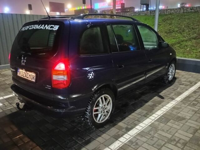 Синий Опель Зафира, объемом двигателя 2 л и пробегом 360 тыс. км за 2700 $, фото 4 на Automoto.ua