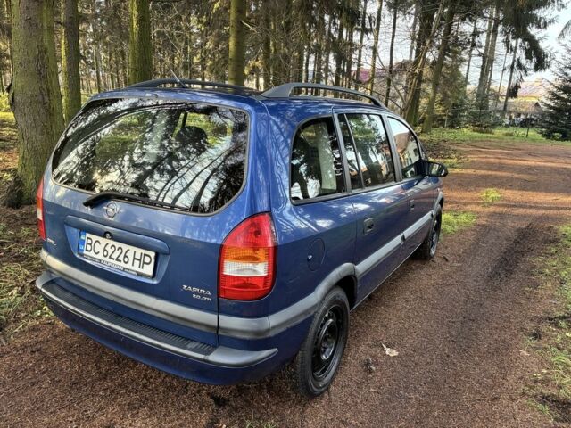 Синий Опель Зафира, объемом двигателя 2 л и пробегом 272 тыс. км за 3500 $, фото 4 на Automoto.ua