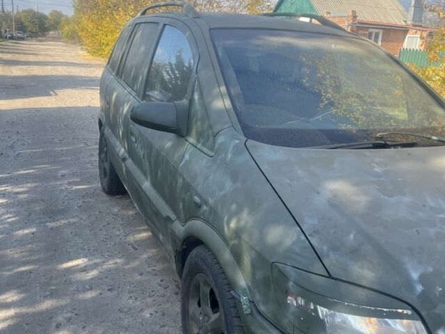 Синий Опель Зафира, объемом двигателя 2 л и пробегом 1 тыс. км за 950 $, фото 1 на Automoto.ua