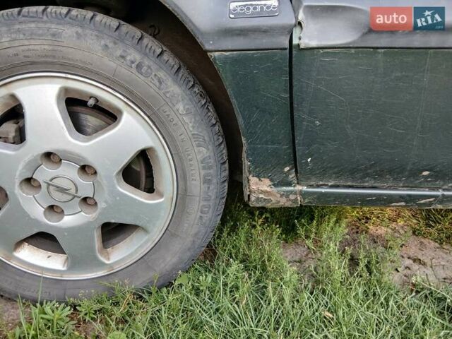 Зеленый Опель Зафира, объемом двигателя 2 л и пробегом 305 тыс. км за 3500 $, фото 2 на Automoto.ua