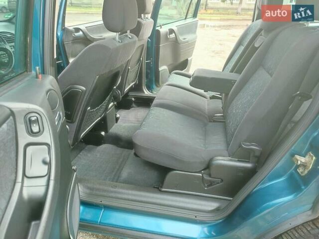 Зеленый Опель Зафира, объемом двигателя 1.8 л и пробегом 207 тыс. км за 5400 $, фото 24 на Automoto.ua