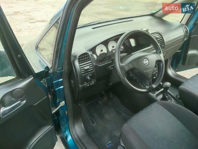Зеленый Опель Зафира, объемом двигателя 1.8 л и пробегом 207 тыс. км за 5400 $, фото 39 на Automoto.ua