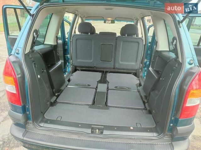 Зеленый Опель Зафира, объемом двигателя 1.8 л и пробегом 207 тыс. км за 5400 $, фото 34 на Automoto.ua