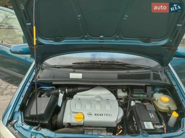 Зеленый Опель Зафира, объемом двигателя 1.8 л и пробегом 207 тыс. км за 5400 $, фото 42 на Automoto.ua