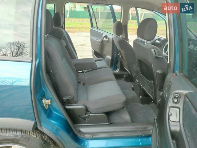 Зеленый Опель Зафира, объемом двигателя 1.8 л и пробегом 207 тыс. км за 5400 $, фото 28 на Automoto.ua