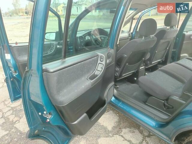 Зеленый Опель Зафира, объемом двигателя 1.8 л и пробегом 207 тыс. км за 5400 $, фото 23 на Automoto.ua