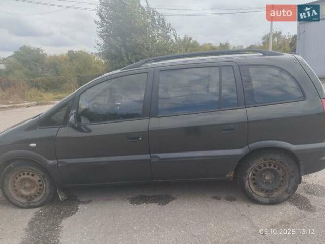 Зеленый Опель Зафира, объемом двигателя 2 л и пробегом 400 тыс. км за 3500 $, фото 1 на Automoto.ua