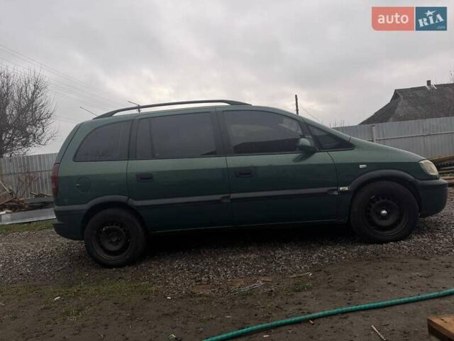 Зеленый Опель Зафира, объемом двигателя 2 л и пробегом 250 тыс. км за 2400 $, фото 1 на Automoto.ua