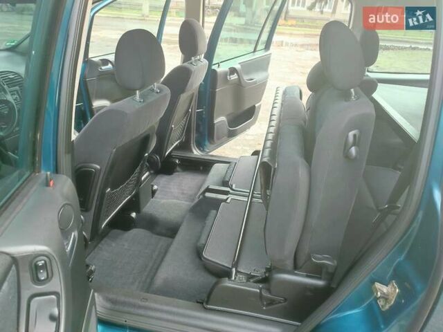 Зеленый Опель Зафира, объемом двигателя 1.8 л и пробегом 207 тыс. км за 5400 $, фото 31 на Automoto.ua