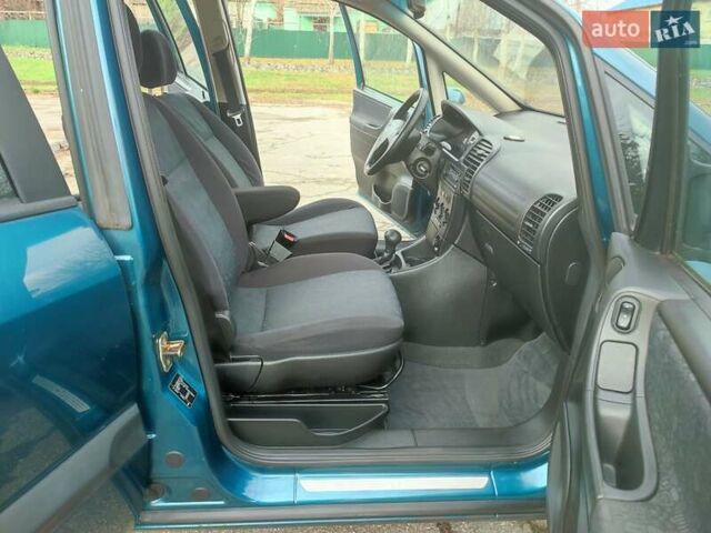 Зеленый Опель Зафира, объемом двигателя 1.8 л и пробегом 207 тыс. км за 5400 $, фото 26 на Automoto.ua