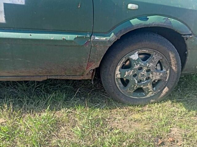 Зеленый Опель Зафира, объемом двигателя 2 л и пробегом 385 тыс. км за 592 $, фото 3 на Automoto.ua