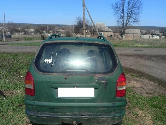 Зеленый Опель Зафира, объемом двигателя 2 л и пробегом 385 тыс. км за 592 $, фото 1 на Automoto.ua
