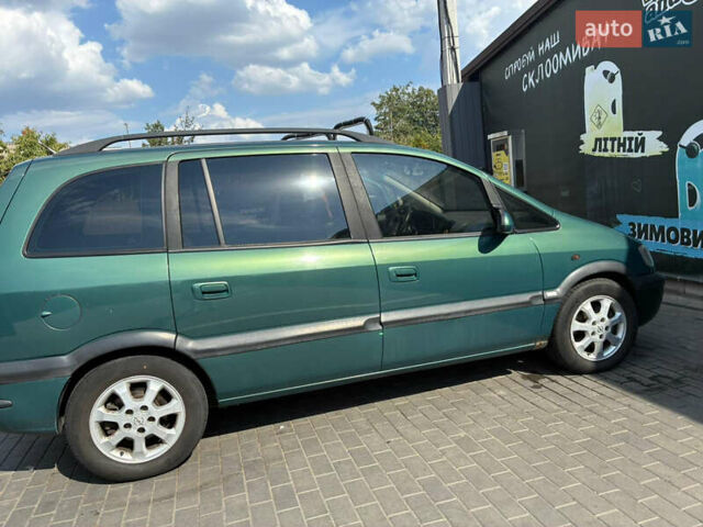 Зеленый Опель Зафира, объемом двигателя 2 л и пробегом 254 тыс. км за 3800 $, фото 28 на Automoto.ua