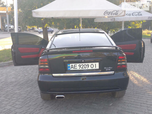 Черный Опель Astra Coupe Bertone, объемом двигателя 2 л и пробегом 175 тыс. км за 5500 $, фото 1 на Automoto.ua