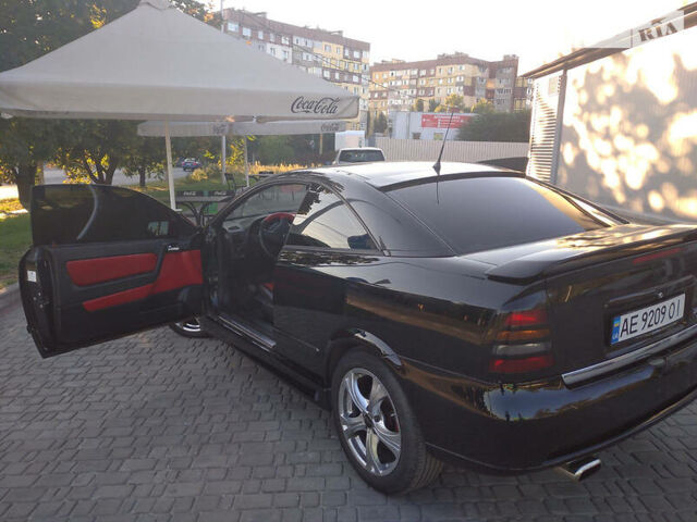 Чорний Опель Astra Coupe Bertone, об'ємом двигуна 2 л та пробігом 175 тис. км за 5500 $, фото 3 на Automoto.ua