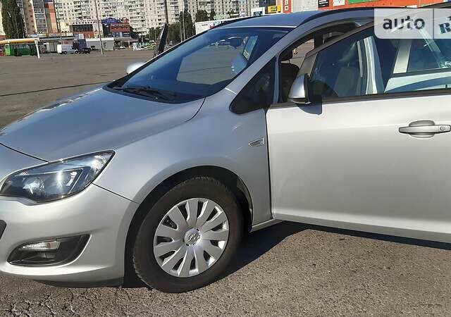 Серый Опель Astra Sports Tourer, объемом двигателя 1.6 л и пробегом 114 тыс. км за 9843 $, фото 7 на Automoto.ua