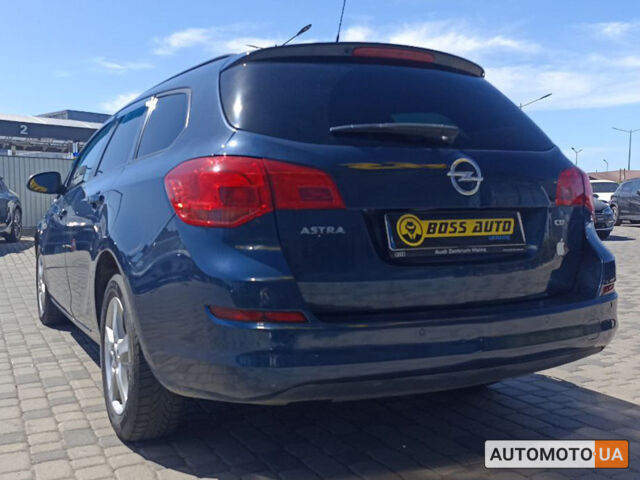 Синий Опель Astra Sports Tourer, объемом двигателя 1.7 л и пробегом 222 тыс. км за 7300 $, фото 4 на Automoto.ua