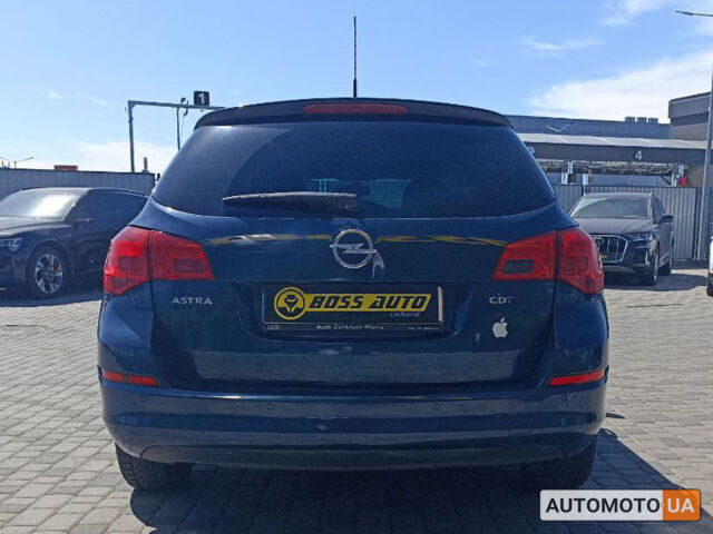 Синий Опель Astra Sports Tourer, объемом двигателя 1.7 л и пробегом 222 тыс. км за 7300 $, фото 5 на Automoto.ua