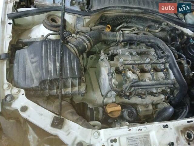 Белый Опель Combo-e, объемом двигателя 1.3 л и пробегом 250 тыс. км за 1500 $, фото 2 на Automoto.ua