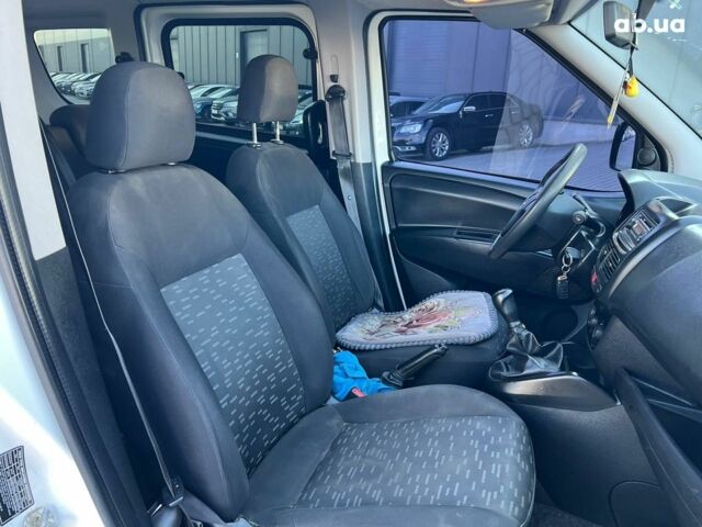 Опель Combo Life 2013 в Львове на Automoto.ua Белый Опель Combo Life, объемом двигателя 1.3 л и пробегом 242 тыс. км за 7990 $, фото 31 на Automoto.ua