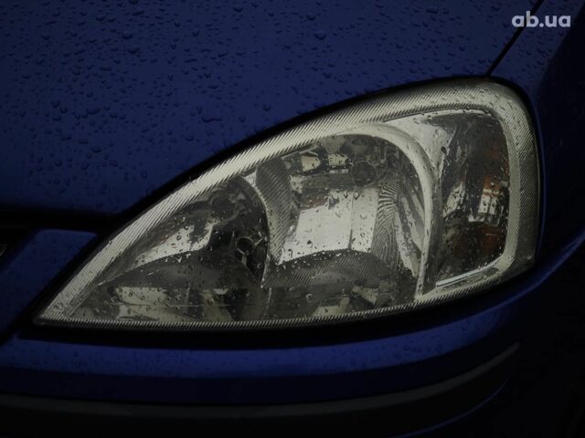 Синий Опель Combo Life, объемом двигателя 1.7 л и пробегом 353 тыс. км за 4690 $, фото 4 на Automoto.ua