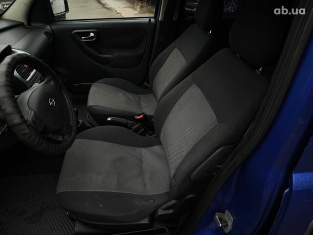 Синий Опель Combo Life, объемом двигателя 1.7 л и пробегом 353 тыс. км за 4690 $, фото 18 на Automoto.ua