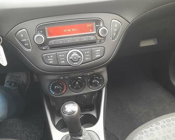 Зеленый Опель Corsa-e, объемом двигателя 1.25 л и пробегом 333 тыс. км за 7150 $, фото 12 на Automoto.ua