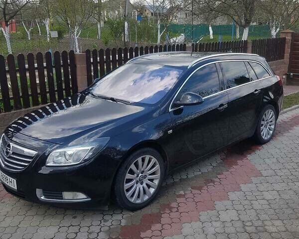 Черный Опель Insignia Sports Tourer, объемом двигателя 2 л и пробегом 227 тыс. км за 7650 $, фото 1 на Automoto.ua